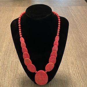 Red stone necklace.